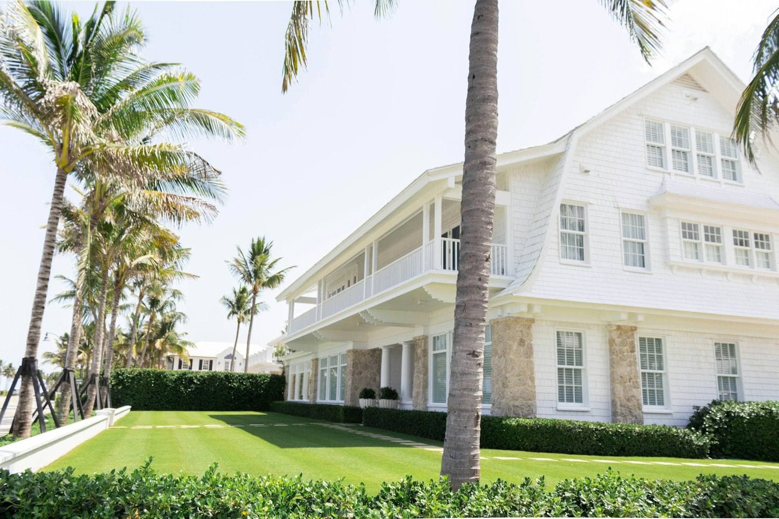 White Florida house framed by palm trees. Citrus County appeal guide.
